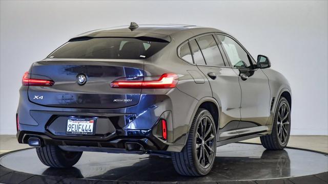 used 2023 BMW X4 car, priced at $44,099