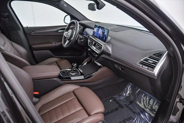 used 2023 BMW X4 car, priced at $44,099