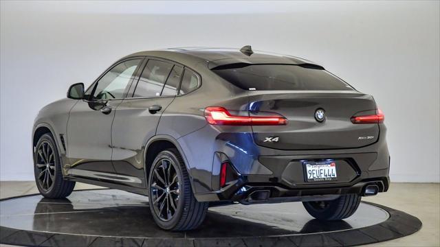 used 2023 BMW X4 car, priced at $44,099