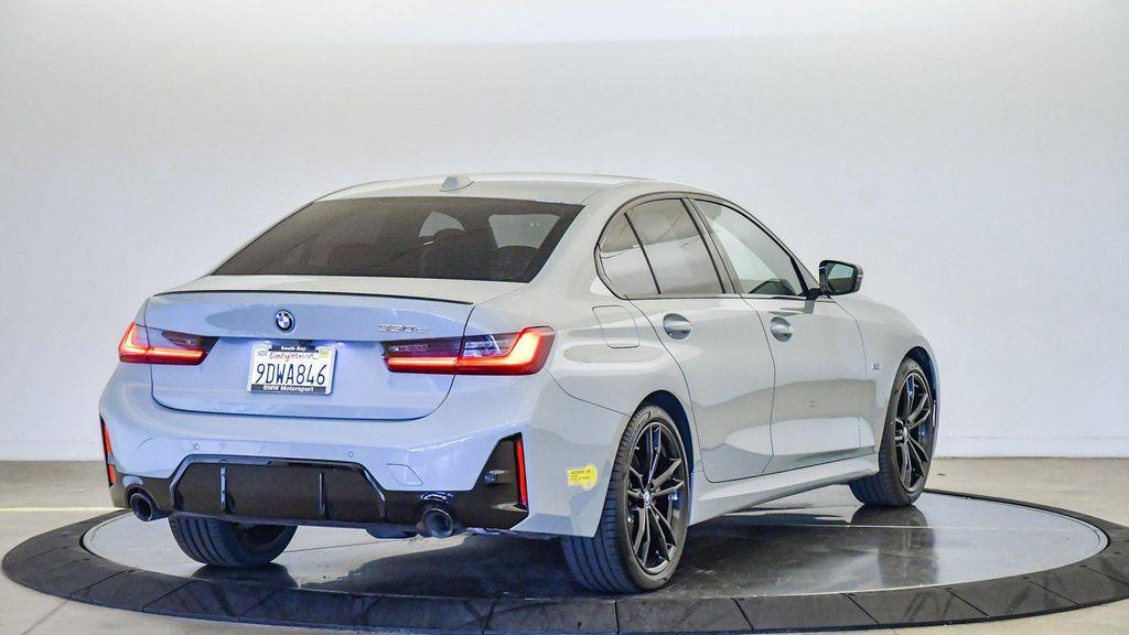 used 2023 BMW 330e car, priced at $35,320