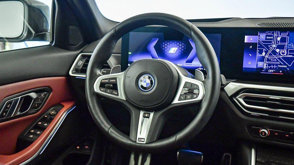 used 2023 BMW 330e car, priced at $35,320