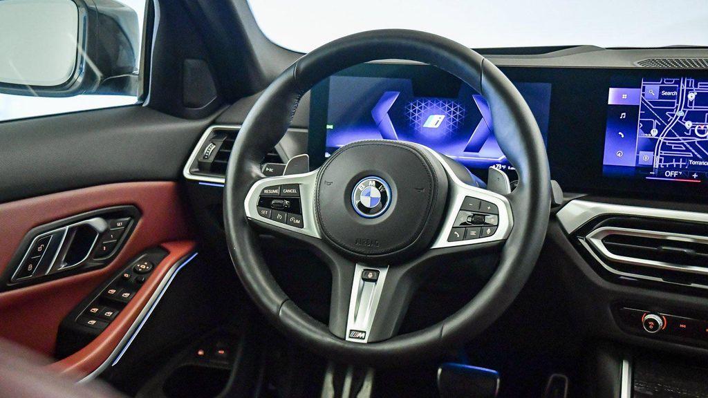 used 2023 BMW 330e car, priced at $35,320