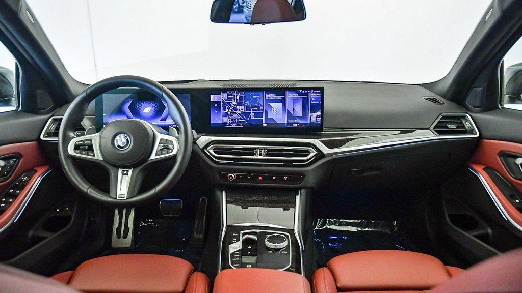 used 2023 BMW 330e car, priced at $35,320