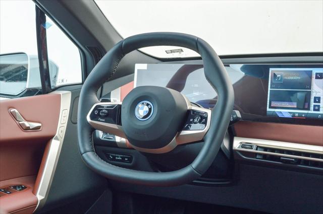 new 2025 BMW iX car, priced at $88,595