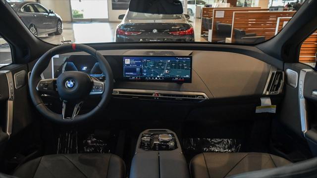 new 2025 BMW iX car, priced at $104,850