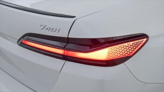 new 2025 BMW 740 car, priced at $97,525