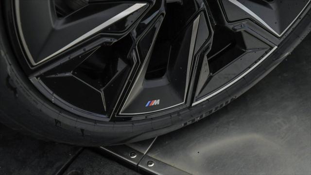 new 2025 BMW 740 car, priced at $97,525