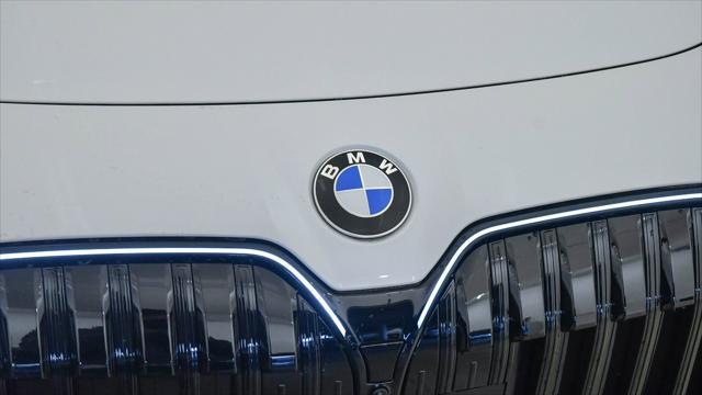new 2025 BMW 740 car, priced at $97,525