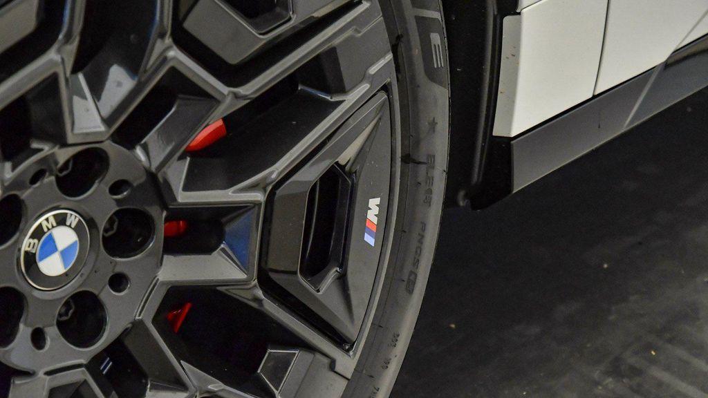 new 2026 BMW iX car, priced at $85,375