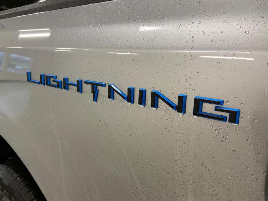 new 2023 Ford F-150 Lightning car, priced at $73,990
