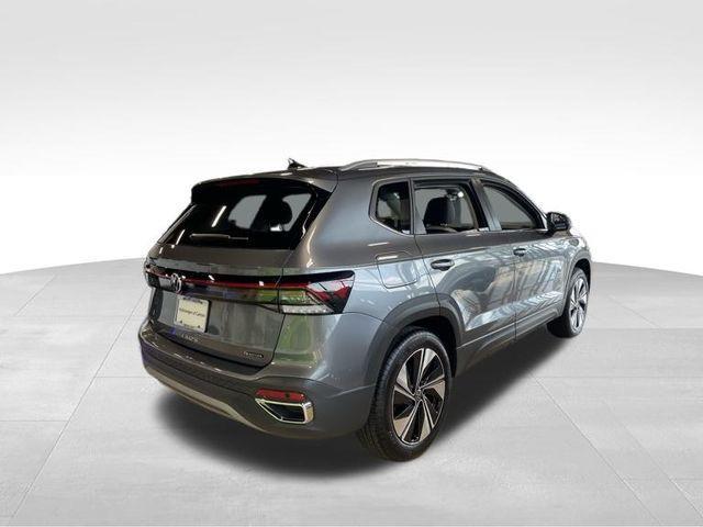 used 2025 Volkswagen Taos car, priced at $28,556