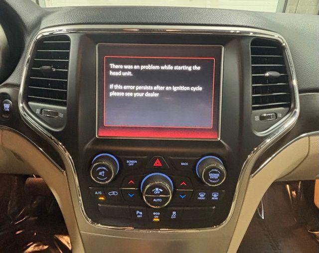 used 2014 Jeep Grand Cherokee car, priced at $11,591