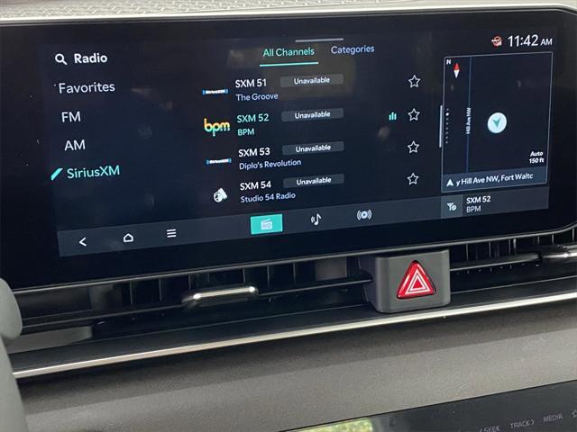 new 2025 Kia Carnival Hybrid car, priced at $44,875