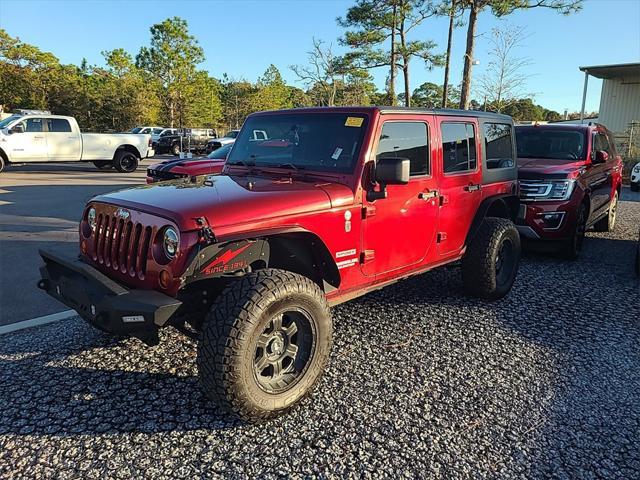 used 2013 Jeep Wrangler Unlimited car, priced at $16,799