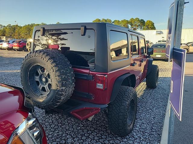 used 2013 Jeep Wrangler Unlimited car, priced at $16,799