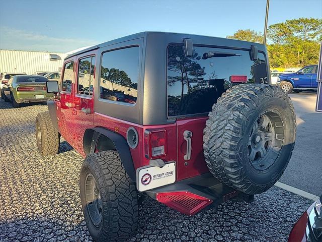 used 2013 Jeep Wrangler Unlimited car, priced at $16,799