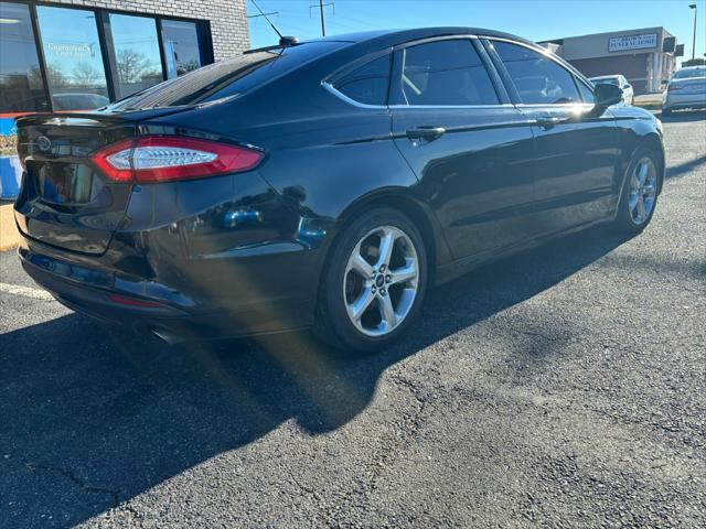 used 2015 Ford Fusion car, priced at $7,999