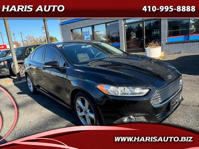 used 2015 Ford Fusion car, priced at $7,999