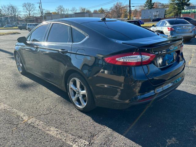 used 2015 Ford Fusion car, priced at $7,999