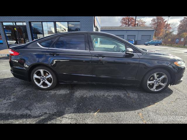 used 2015 Ford Fusion car, priced at $7,999