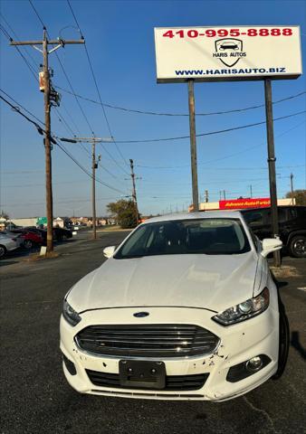 used 2016 Ford Fusion car, priced at $8,900