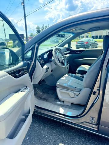 used 2014 Nissan Quest car, priced at $9,900