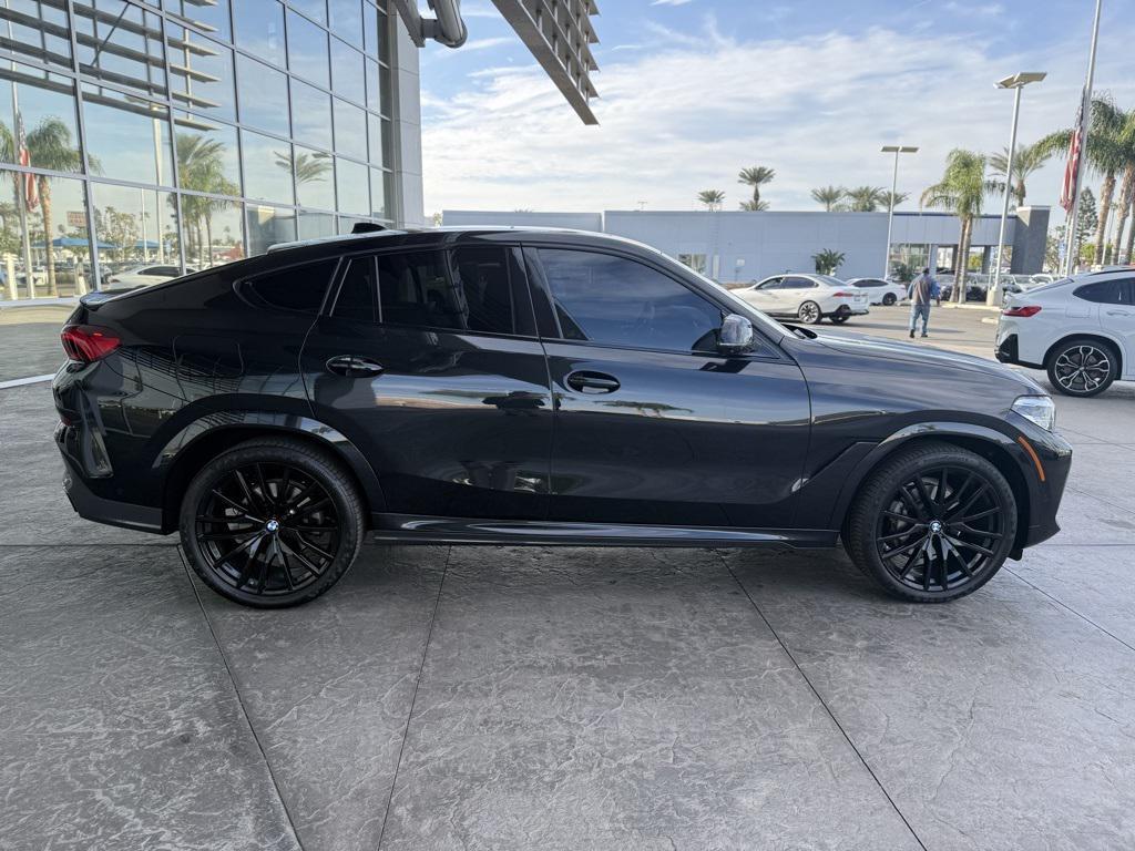 used 2023 BMW X6 car, priced at $54,990