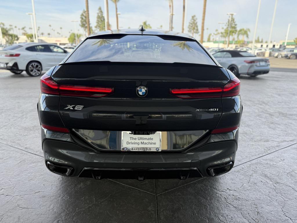 used 2023 BMW X6 car, priced at $54,990