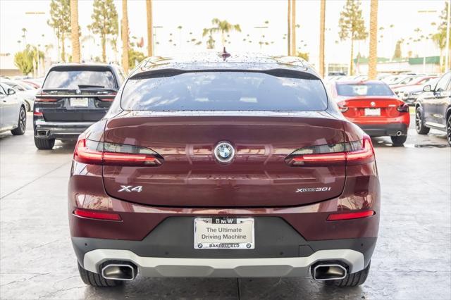 used 2022 BMW X4 car, priced at $38,490