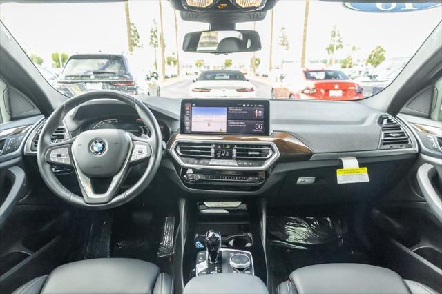 used 2022 BMW X4 car, priced at $38,490