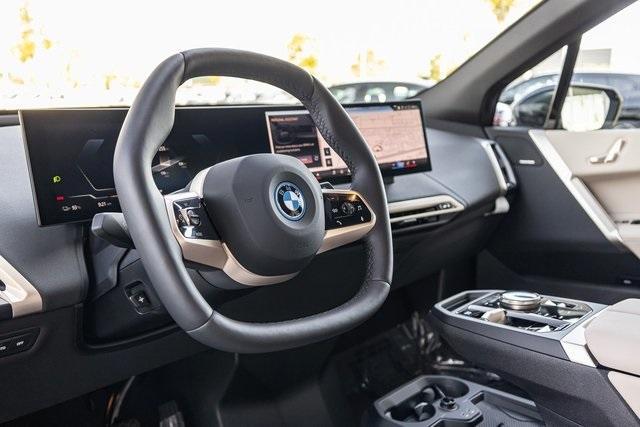 new 2024 BMW iX car, priced at $96,545