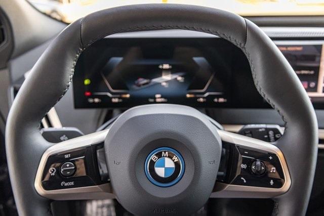 new 2024 BMW iX car, priced at $96,545
