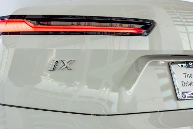 new 2024 BMW iX car, priced at $94,045