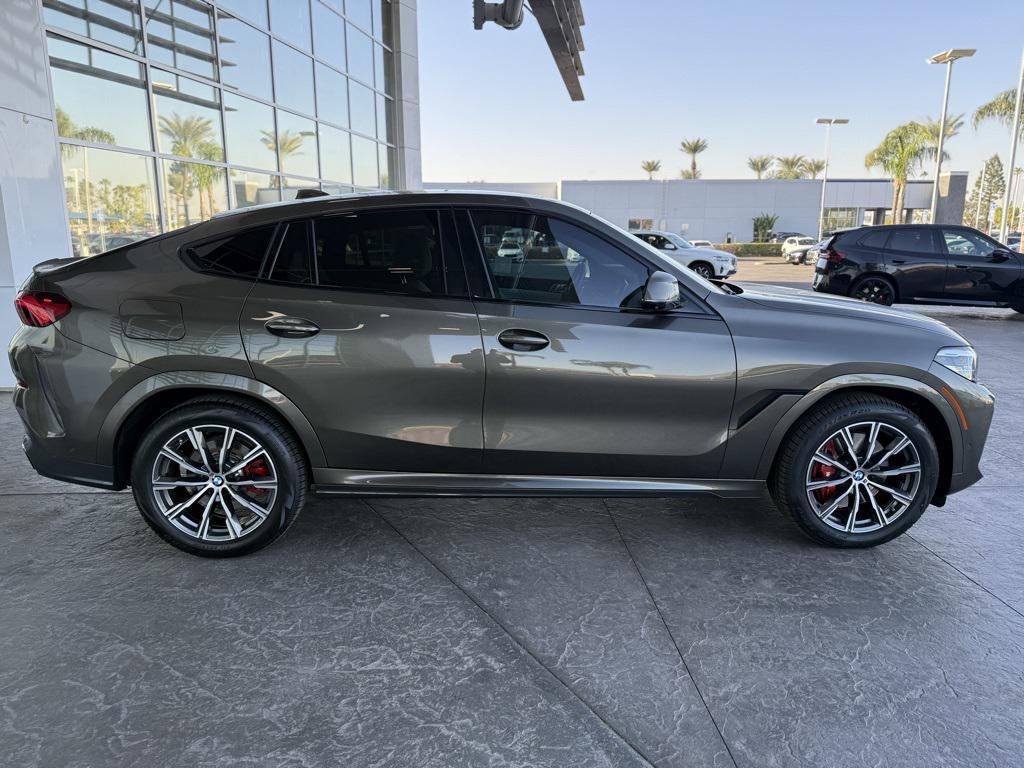 used 2023 BMW X6 car, priced at $58,990