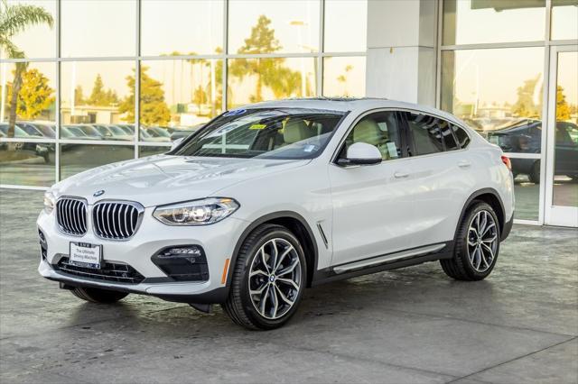 used 2021 BMW X4 car, priced at $38,990