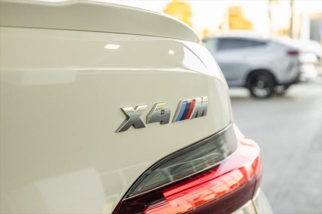 used 2022 BMW X4 M car, priced at $50,990