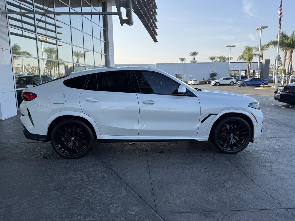 used 2024 BMW X6 car, priced at $76,990