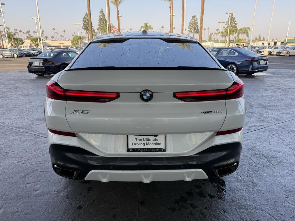 used 2024 BMW X6 car, priced at $76,990