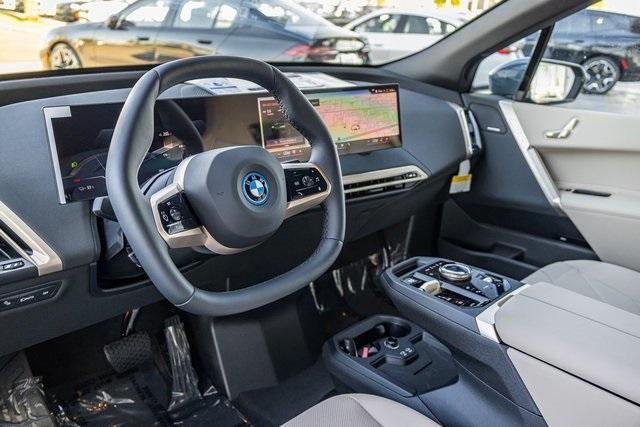 new 2024 BMW iX car, priced at $98,495