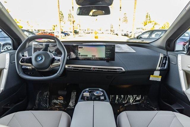 new 2024 BMW iX car, priced at $98,495