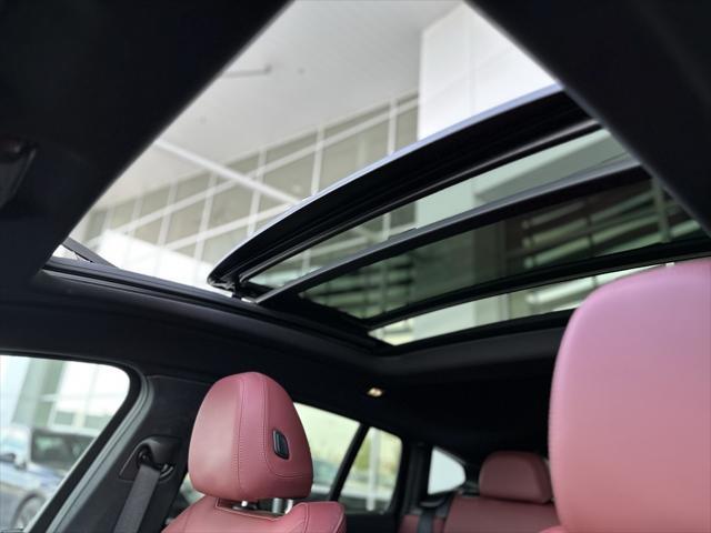 used 2022 BMW X4 car, priced at $47,990