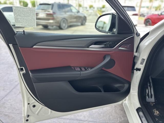 used 2022 BMW X4 car, priced at $47,990