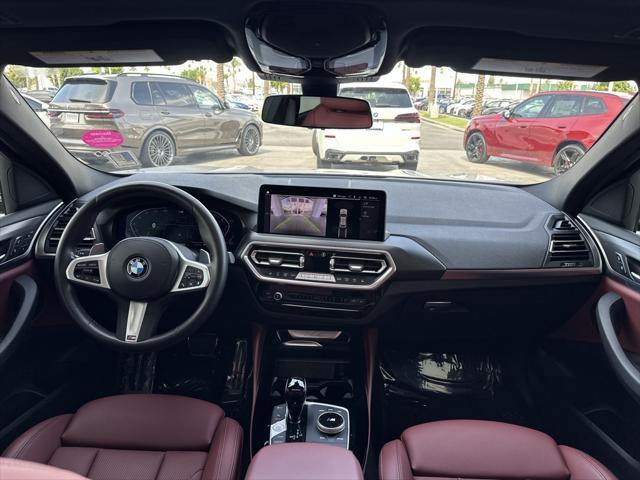 used 2022 BMW X4 car, priced at $47,990