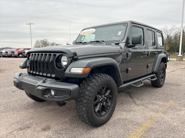 used 2023 Jeep Wrangler car, priced at $36,590