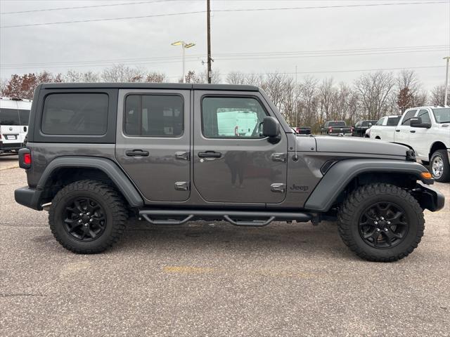 used 2023 Jeep Wrangler car, priced at $36,590