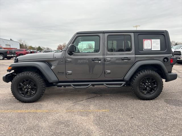 used 2023 Jeep Wrangler car, priced at $36,590