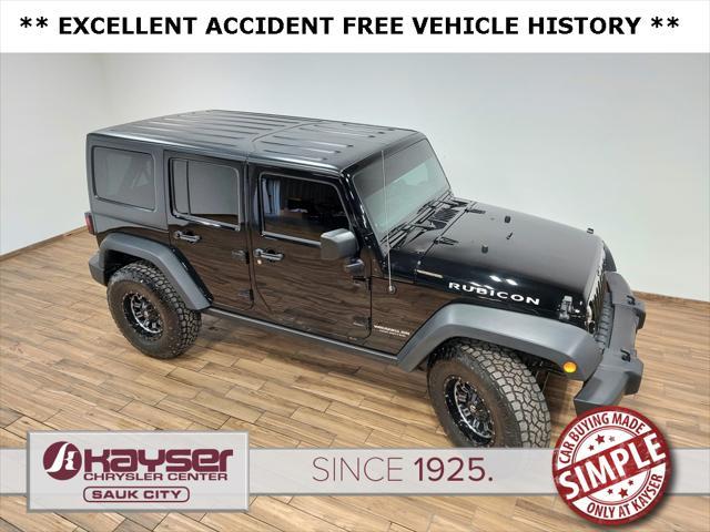used 2014 Jeep Wrangler Unlimited car, priced at $22,789