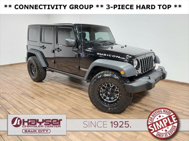 used 2014 Jeep Wrangler Unlimited car, priced at $22,789