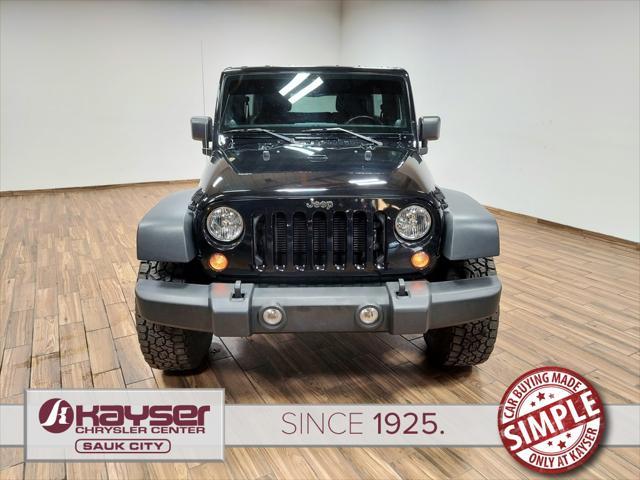 used 2014 Jeep Wrangler Unlimited car, priced at $22,789