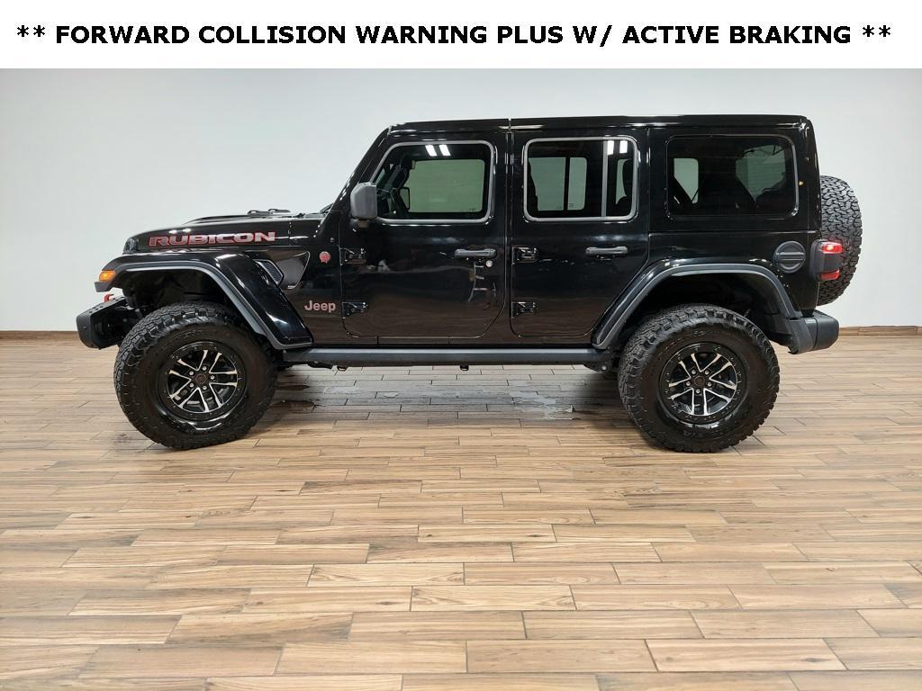 used 2024 Jeep Wrangler car, priced at $52,550